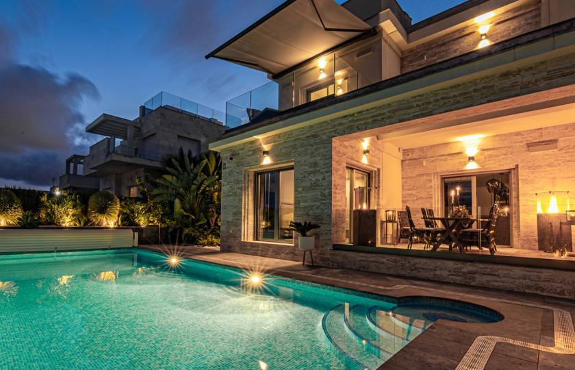 What influences property prices in Orihuela Costa?