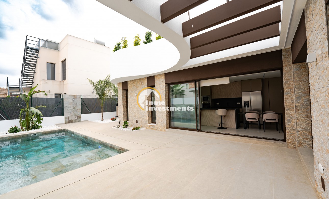 Obra nueva - Chalet adosado - Heredades