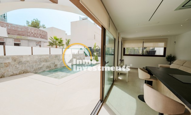 Obra nueva - Chalet adosado - Heredades