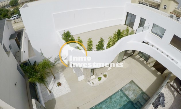 Obra nueva - Chalet adosado - Heredades