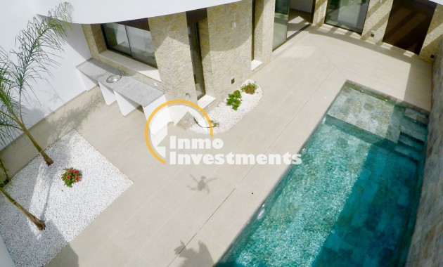 Obra nueva - Chalet adosado - Heredades