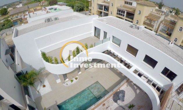 Obra nueva - Chalet adosado - Heredades