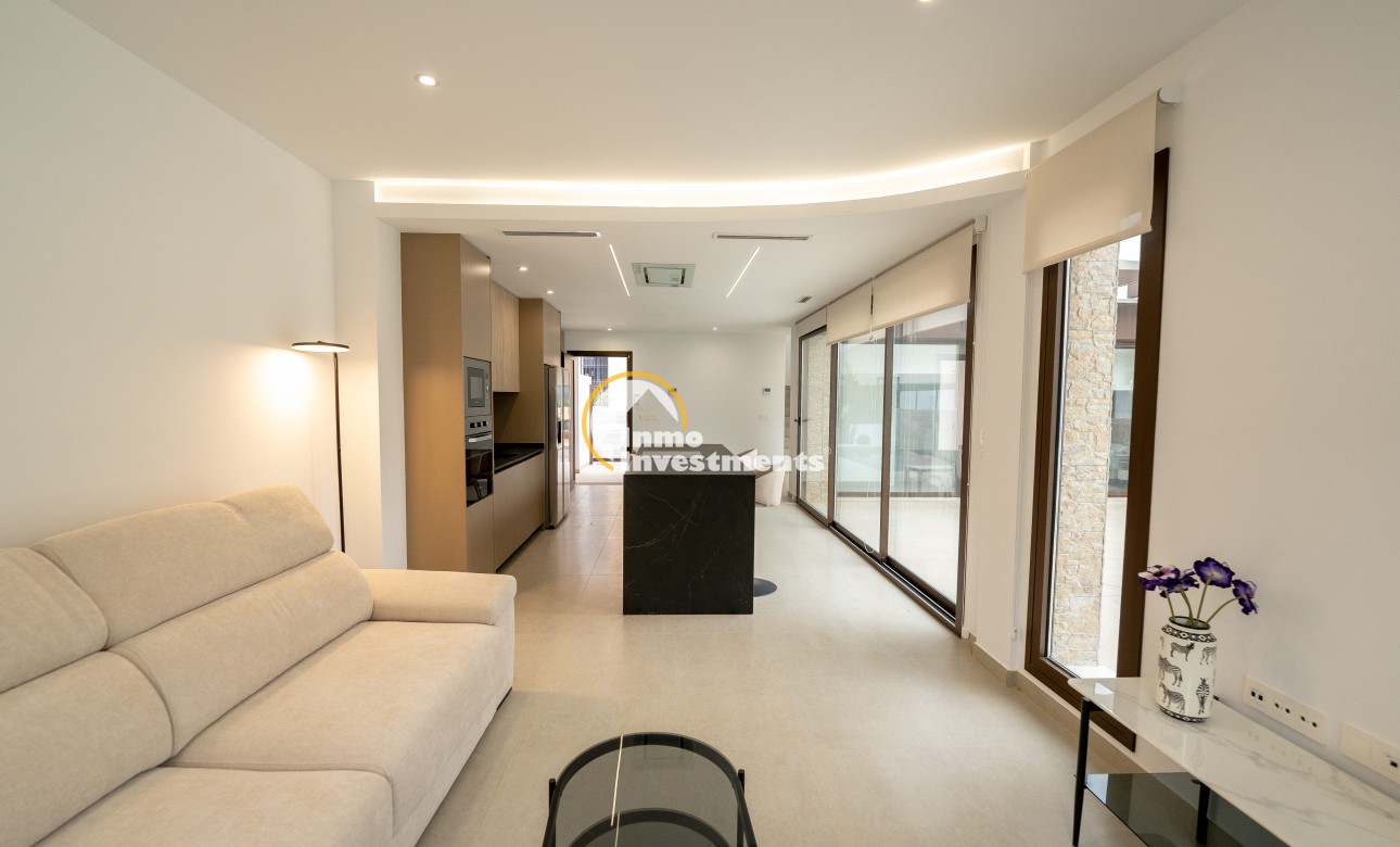 Obra nueva - Chalet adosado - Heredades